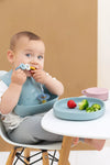 Assiette bébé en silicone Alfie le Lion coloris jade The Cotton Cloud