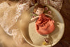 Attache-tétine poupée paon Pia Jollein terracotta bébé