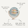 Jouet spinner à ventouse Mushie pour bébé bleu et beige