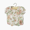 Barboteuse Eva en gaze de coton motif fleuri lili rose pour poupées Babies Minikane