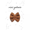 Barrette enfant noeud ocre à étoiles argentées Mini Galaxie