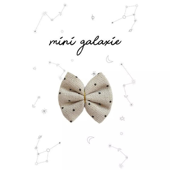 Barrette enfant Mini Galaxie en tissu gris à pois noirs avec nœud