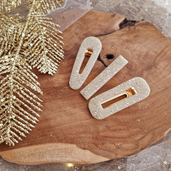 Barrette résine arrondie crème or Les Noeuds de Maman.