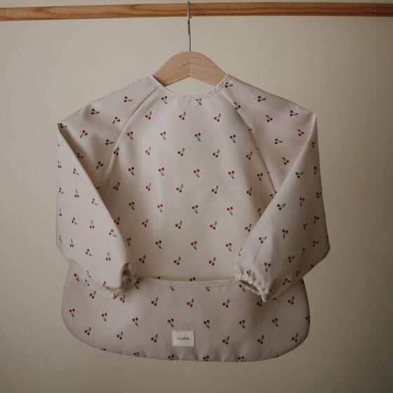 Bavoir à manches longues imperméable Cherries Mushie – Repas bébé sans salissures