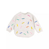 Bavoir à manches longues imperméable motif Confetti The Cotton Cloud