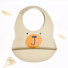  Bavoir silicone beige motif ours avec poche pour bébé Les Petits Citrons.