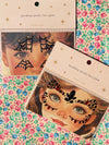 Bijoux de visage noirs et rouges scintillants pour maquillage Halloween enfant – Konges Sløjd