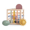 Boîte à formes avec élastiques Mushie et formes en silicone pour bébé