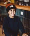 Bonnet enfant Hello Hossy Color Block Blacky marron et noir avec pompon