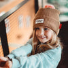 Bonnet enfant Hello Hossy Color Block Macaroon camel avec pompon rose doux