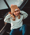 Bonnet enfant Hello Hossy Color Block Macaroon camel avec pompon rose doux