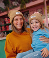 Bonnet enfant Hello Hossy Color Block Macaroon camel avec pompon rose doux