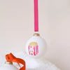 Boule de Noël blanche personnalisable Baubels motif Pop Corn rose et doré avec ruban rose