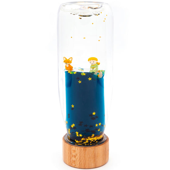 Bouteille sensorielle Le Petit Prince Petit Boum – jouet d’éveil liquide avec paillettes et figurines pour bébé