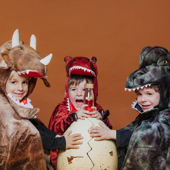 Bouteille sensorielle Petit Boum Move T-Rex avec liquide rouge et dinosaure flottant