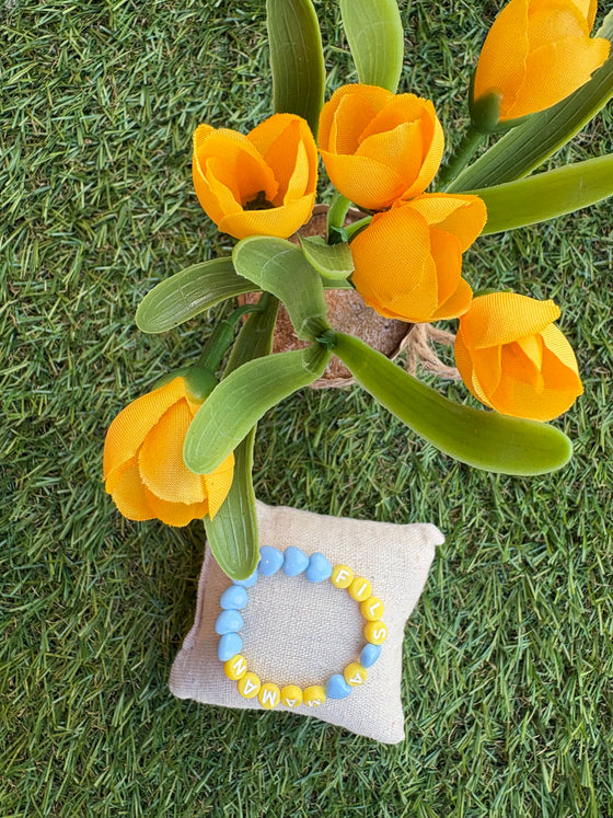 Bracelet enfant Fils à Maman avec cœurs bleu pastel et perles jaunes – GAGA