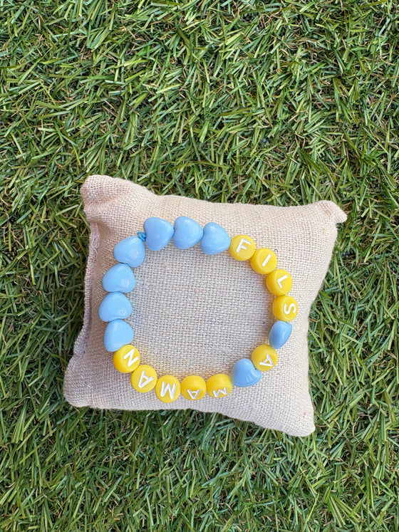 Bracelet enfant Fils à Maman avec cœurs bleu pastel et perles jaunes – GAGA