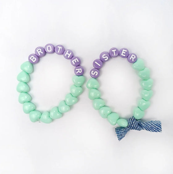 Bracelet enfant GAGA Kids Sister en perles lavande et cœurs vert pastel