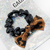 Bracelet GAGA maxi cœurs écru, noir ou rouge avec nœud léopard
