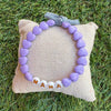 Bracelet MAMA pour maman – perles blanches lettres dorées et cœurs lavande