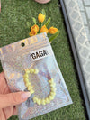 Bracelet MAMA avec perles violettes et cœurs jaune pastel – GAGA Kids