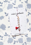 Bracelet MAMAN Mini Galaxie cordon rose lettres dorées pompon rouge