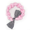 Bracelet enfant rose avec perles cœur et nœud vichy noir et blanc – Gaga