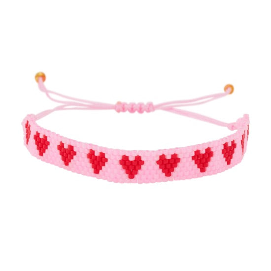 Bracelet perlé cœur rouge Atelier Wagram sur carte cadeau – idée cadeau amour