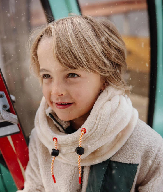 Cagoule enfant Hello Hossy Warmy Cream en polaire douce avec cordons ajustables