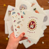 Carte Joyeuses Pâques Papier Poetic avec lapin couronne de fleurs dans un œuf décoré