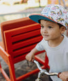 Casquette enfant Hello Hossy Happy Ride motif voitures jaunes et visière orange – accessoire enfant été tendance