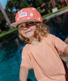 Casquette enfant Hello Hossy Peachy Bloom corail motif fleurs – accessoire enfant été tendance concept store famille