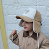 Casquette avec cache oreilles velours et sherpa pour enfant Poule Party.