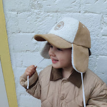  Casquette avec cache oreilles velours et sherpa pour enfant Poule Party.