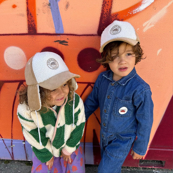 Casquette avec cache oreilles velours et sherpa pour enfant Poule Party.