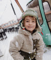 Chapka enfant Hello Hossy Cozy Neo vert doublée polaire avec sangle rouge