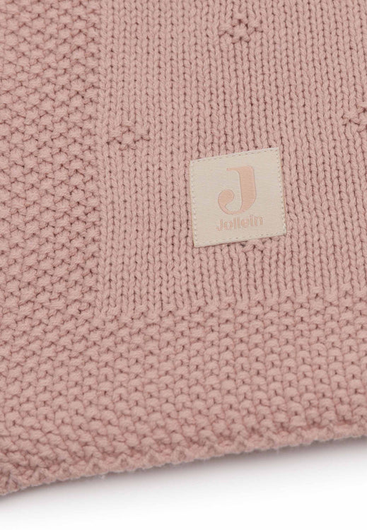 Couverture berceau Cosy Knit Rose Jollein pour bébé.