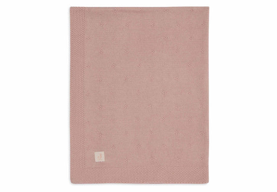 Couverture berceau Cosy Knit Rose Jollein pour bébé.