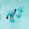 Personnage Blair bleu et deux cubes lumineux pour le bain Glo Pals.