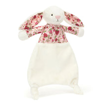 Doudou lapin Jellycat Blossom Cream Berry avec oreilles et haut fleuris, fond blanc