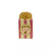 Fève Pop Corn Baubels en porcelaine artisanale rose et dorée sur carte Les Jolies Fèves