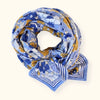 Foulard en coton fleuri bleu et jaune Latika Joy Ocean de la marque Apaches Collections – accessoire de mode pour femme ou enfant, décliné en version petit et grand format, idéal pour le printemps ou l’été