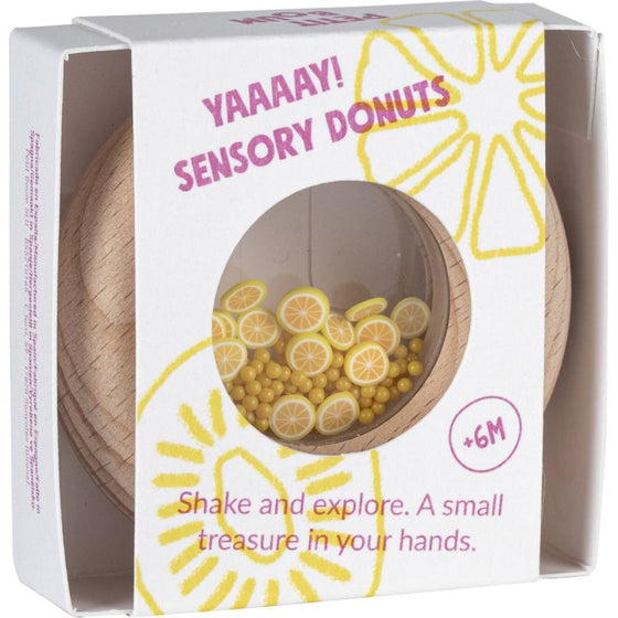 Hochet en bois sensoriel Donut Lemons Petit Boum avec perles jaunes et citrons