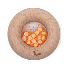  Hochet sensoriel en bois Petit Boum Donut Oranges avec perles et tranches d’orange