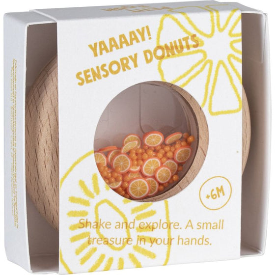 Hochet sensoriel en bois Petit Boum Donut Oranges avec perles et tranches d’orange