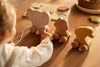 Trois jouets en bois à roulettes Jollies Jollein