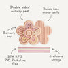 Jouet sensoriel en silicone Fleur Petal Mushie rose avec cordons