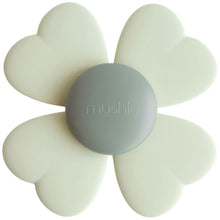  Jouet sensoriel bébé Mushie silicone fleur cœur gris et crème