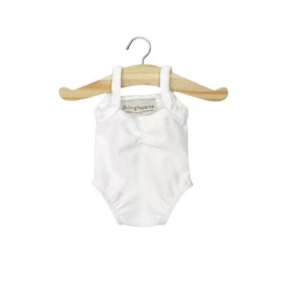 Justaucorps Anna blanc en lycra pour poupées Gordis Minikane suspendu sur cintre