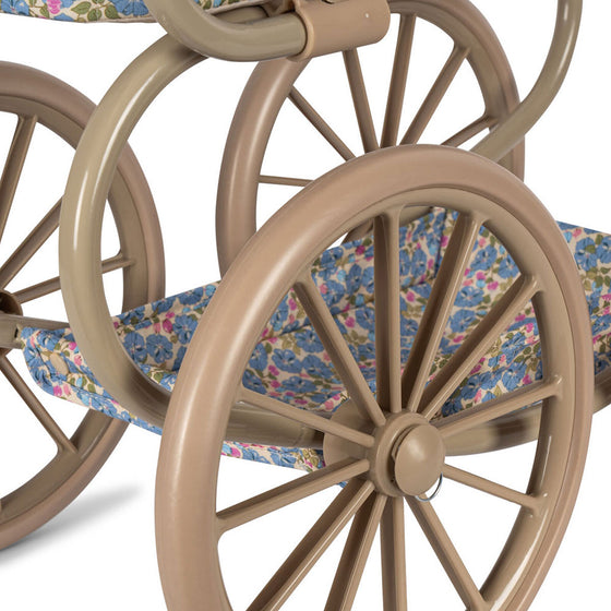 Landau jouet pour poupées Minnie motif fleuri bleu et rose – Konges Sløjd